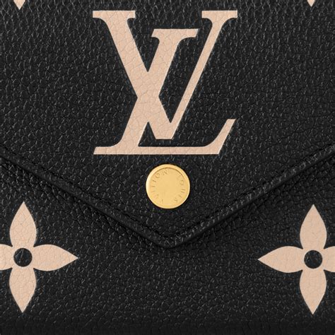 Victorine Wallet Bicolour Monogram Empreinte Leather .